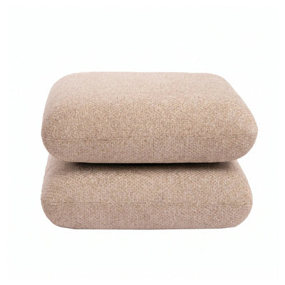 Draaibare taupe Aro Poef van PTMD met zachte bekleding en moderne uitstraling, geschikt als comfortabele zitplek in de woonkamer.