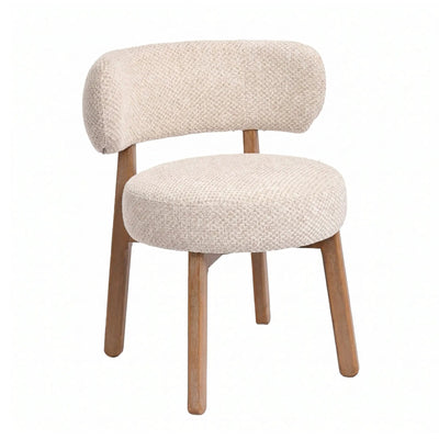 Lior eetkamerstoel van PTMD in crèmekleurige stof met rubberhouten poten, elegante en comfortabele keukenstoel.