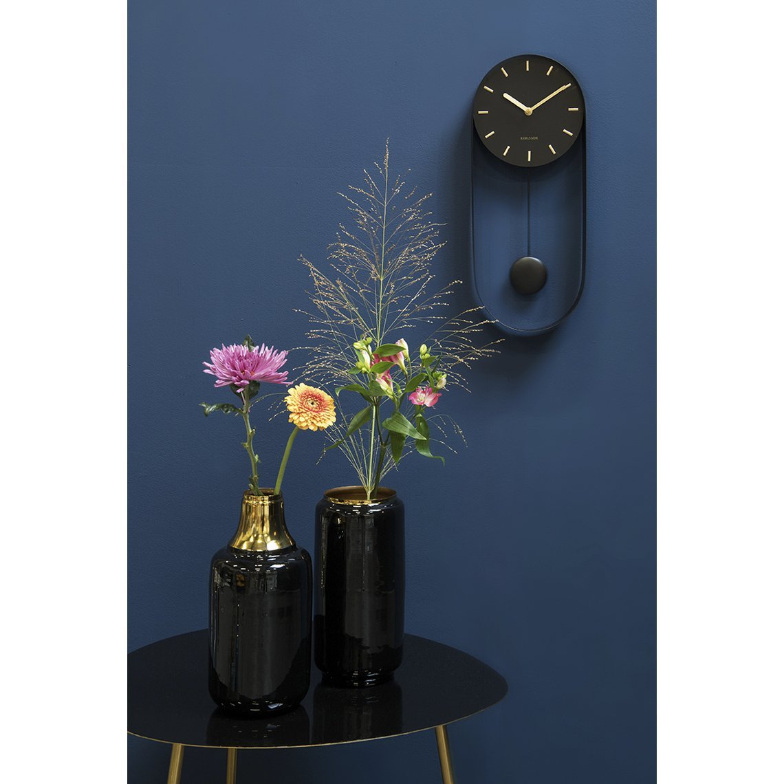 Wandklok slinger charme Zwart