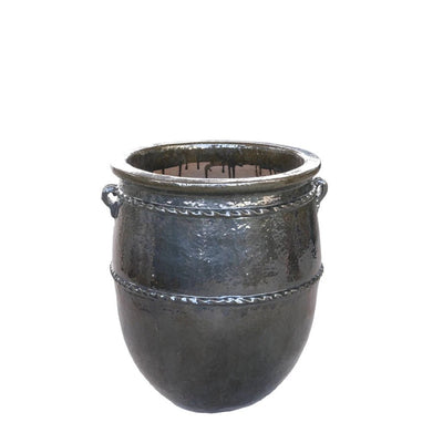Ronde grote keramische pot van PTMD, Tony Green lijn, met een glanzende groene afwerking en een brede, lage vorm.
